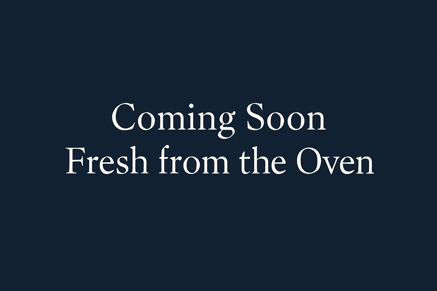 Generate a styled placeholder graphic with a navy blue background with text only stating "Coming Soon - Fresh from the Oven". Please do not add any images.