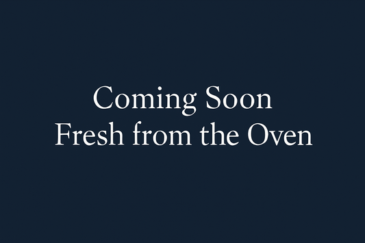 Generate a styled placeholder graphic with a navy blue background with text only stating "Coming Soon - Fresh from the Oven". Please do not add any images.